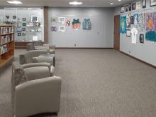 The gallery space on our lower level is adjacent to our All Purpose Room, Fine Arts Center and magazine collection.