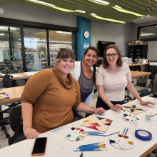 Artisans making barn quilt projects.